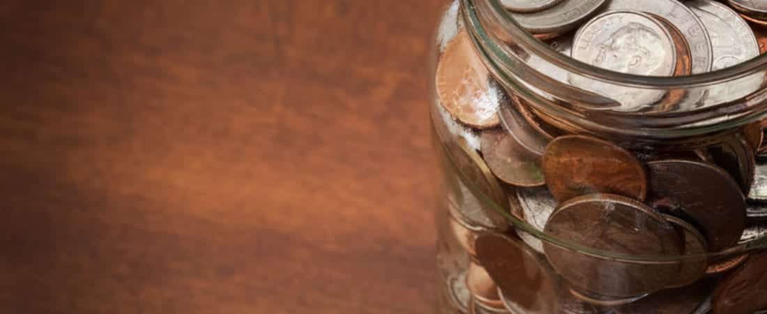 Coins inside a transparent jar