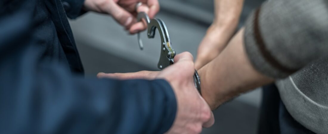 Handcuffing the arrested person. Implementation of the arrest