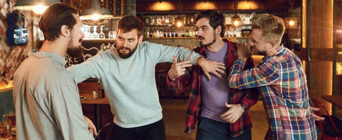 Four men getting into a fight at a bar, disorderly conduct concept.